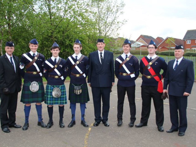 Queens men 2014 receiving their Battalion Certificate